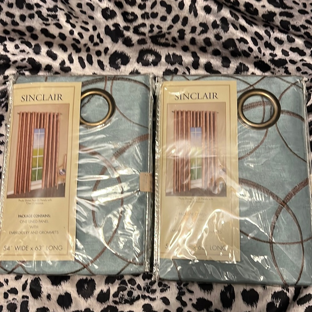 Curtains with two panels total color is blue and brown 54”w 63”L